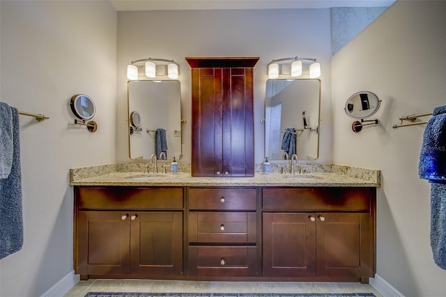 bathroom featuring vanity and tile patterned flooring