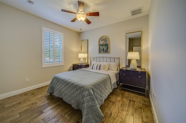 bedroom featuring ceiling fan and wood-type flooring