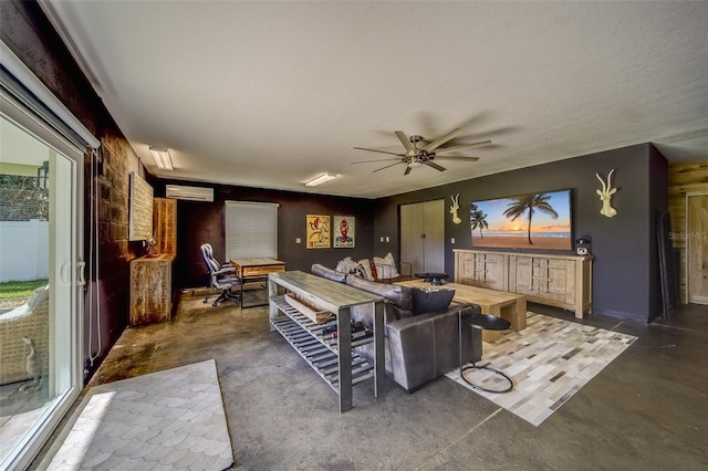 living room featuring a textured ceiling, a wall unit AC, and ceiling fan