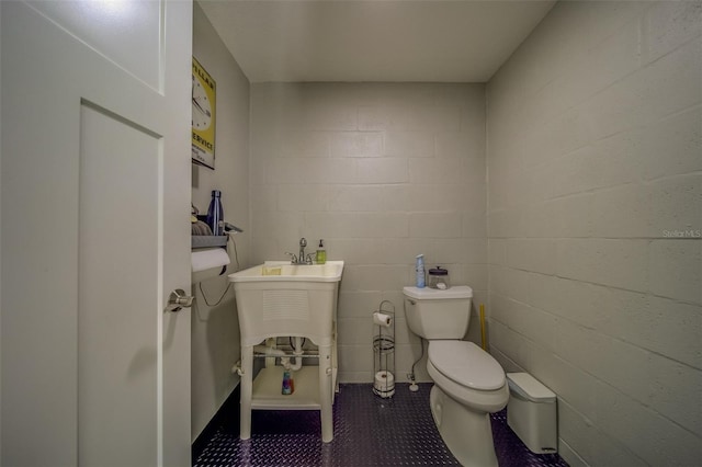 bathroom featuring toilet