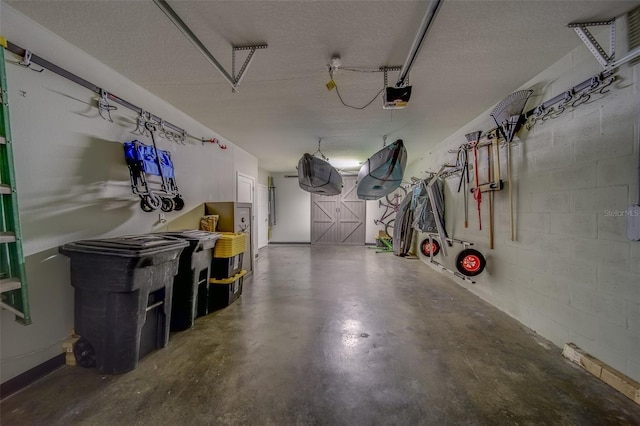 garage featuring a garage door opener