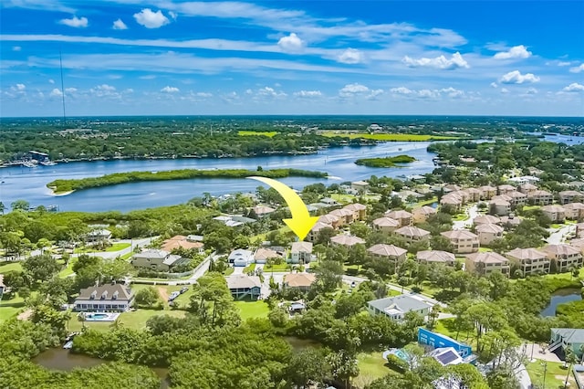 birds eye view of property featuring a water view