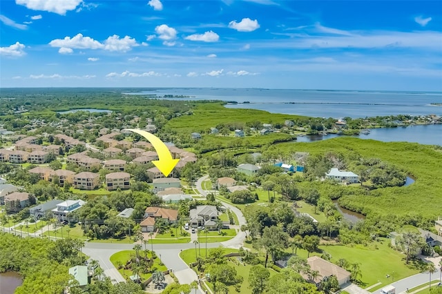 birds eye view of property featuring a water view