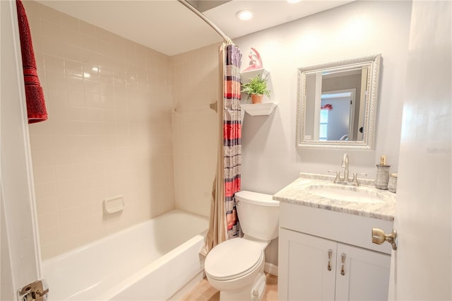 full bathroom featuring vanity, toilet, and shower / bathtub combination with curtain