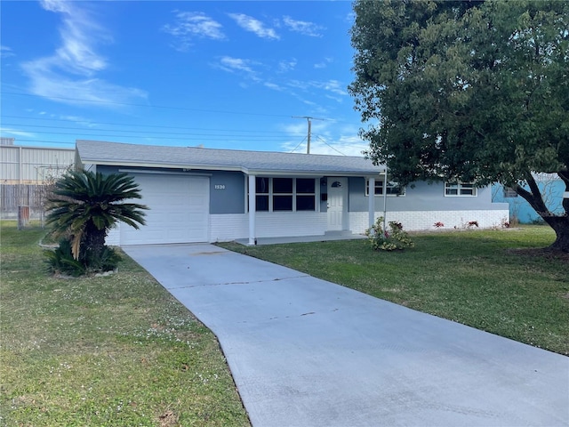 single story home with a garage and a front lawn