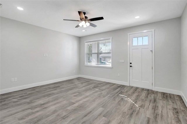 entryway featuring ceiling fan and light hardwood / wood-style floors