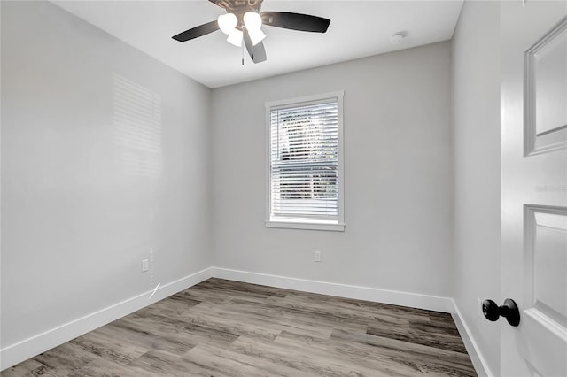 unfurnished room featuring ceiling fan and light wood-type flooring