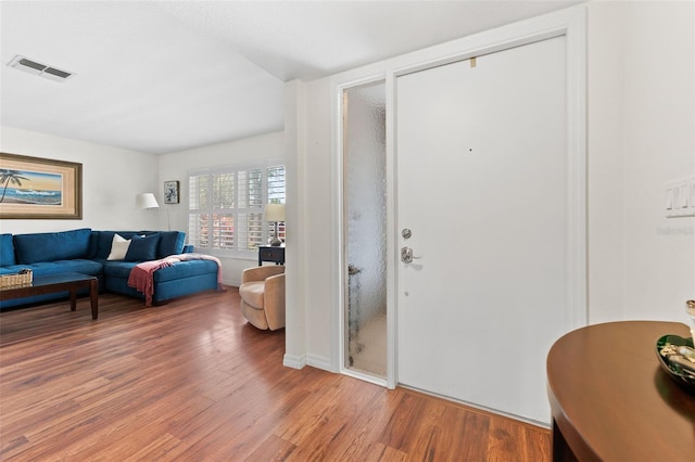 entrance foyer with hardwood / wood-style flooring