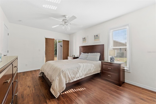 bedroom featuring ceiling fan and dark hardwood / wood-style flooring