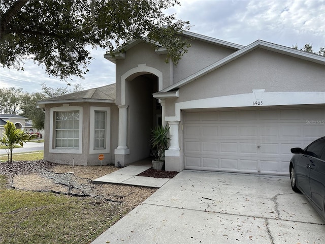 front of property with a garage