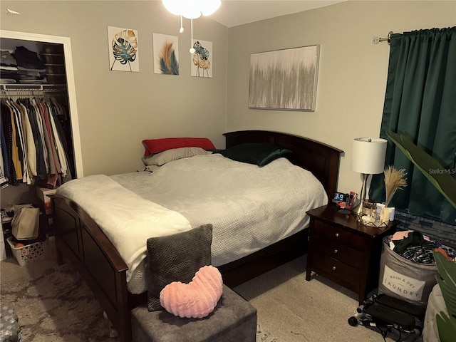 carpeted bedroom with a closet