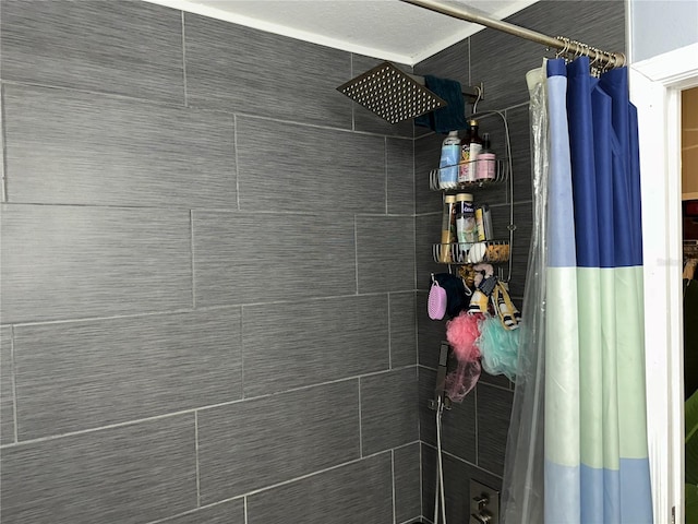 bathroom with a shower with shower curtain