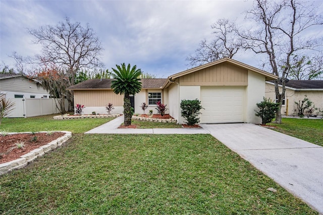 single story home with a front yard and a garage