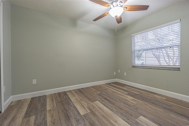 empty room featuring a textured ceiling, ceiling fan, and hardwood / wood-style floors