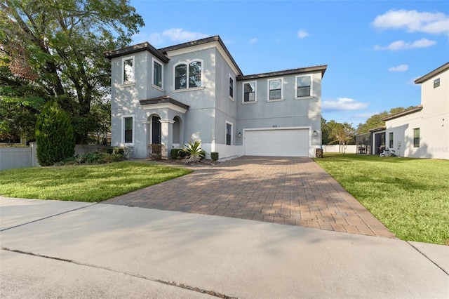 view of front facade with a front lawn and a garage