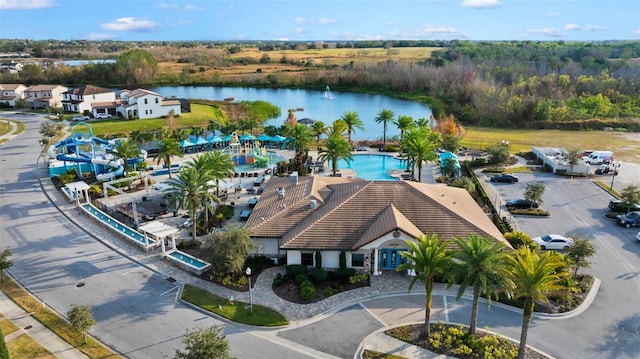 drone / aerial view with a water view