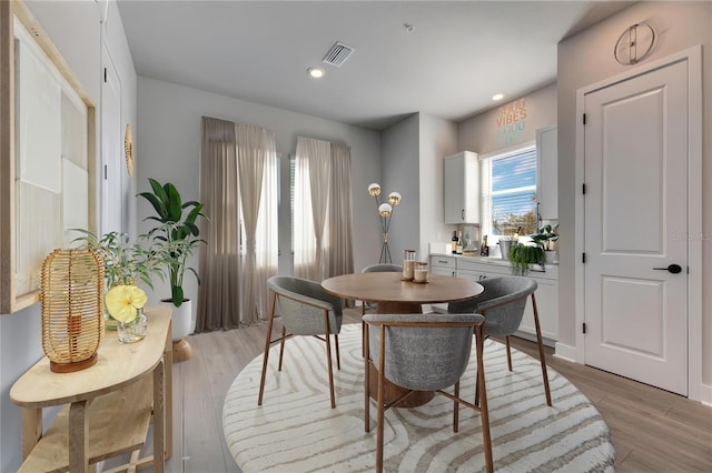 dining room featuring light hardwood / wood-style floors