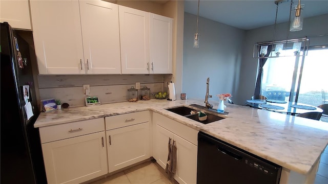 kitchen featuring black appliances, white cabinetry, sink, and kitchen peninsula