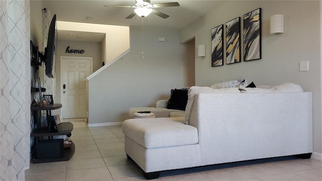 living room with light tile patterned flooring and ceiling fan