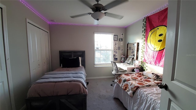 bedroom with light carpet, a closet, and ceiling fan