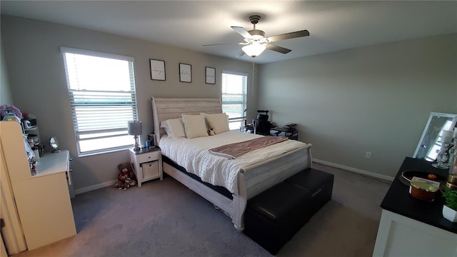 bedroom with ceiling fan and carpet