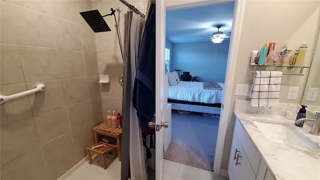 bathroom with vanity, ceiling fan, and a shower with curtain