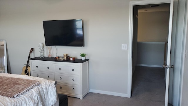 bedroom featuring light colored carpet