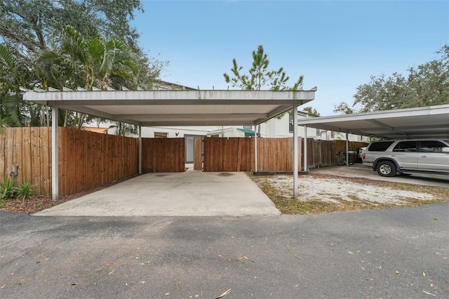 view of parking with a carport