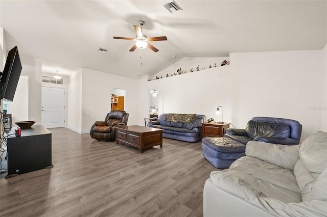 living room with vaulted ceiling, ceiling fan, and hardwood / wood-style floors