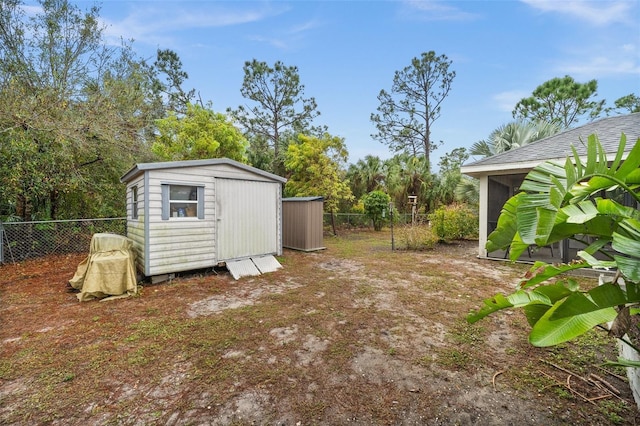 view of yard with a storage unit