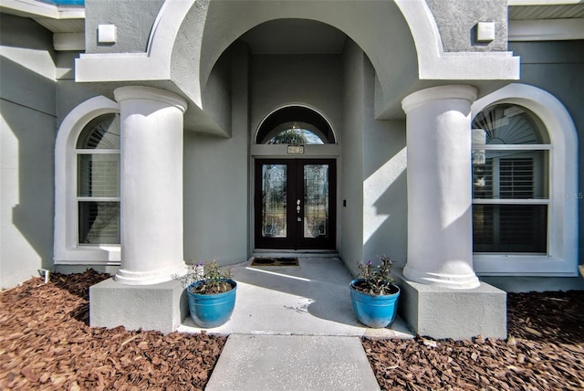 doorway to property featuring french doors