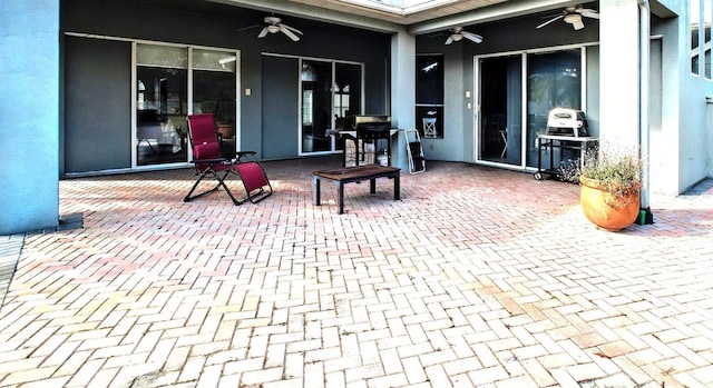 view of patio with ceiling fan