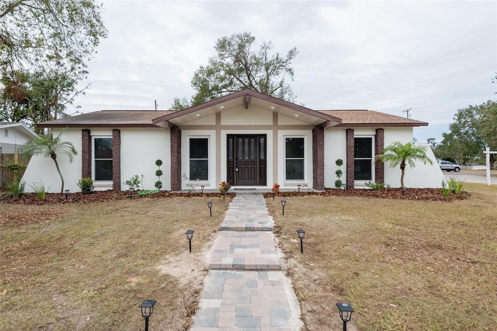 view of front of home with a front yard