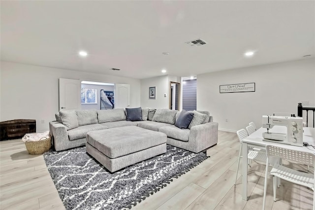 living room featuring light wood-type flooring