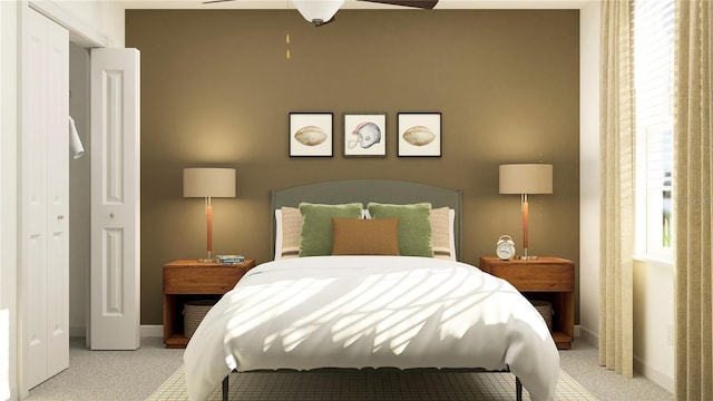 bedroom featuring ceiling fan, light carpet, a closet, and multiple windows