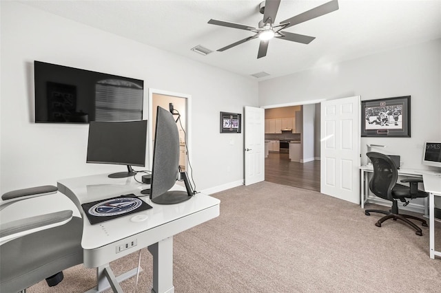 office featuring carpet floors and ceiling fan