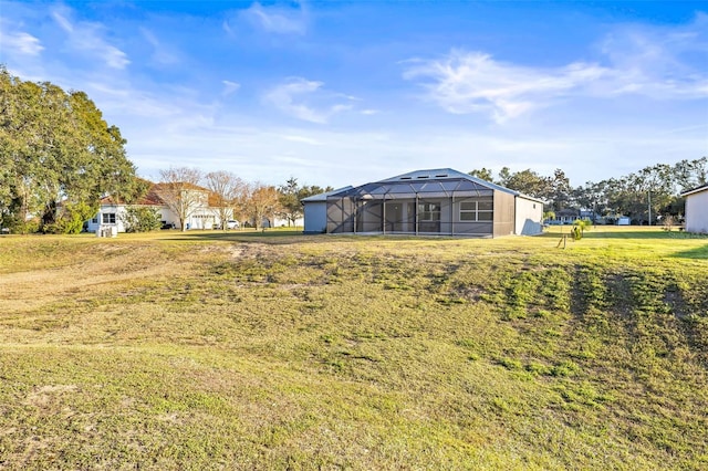 view of yard with a lanai