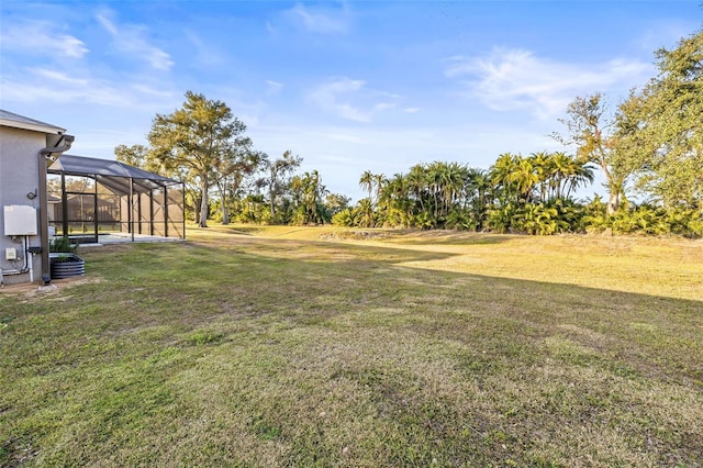 view of yard featuring a lanai