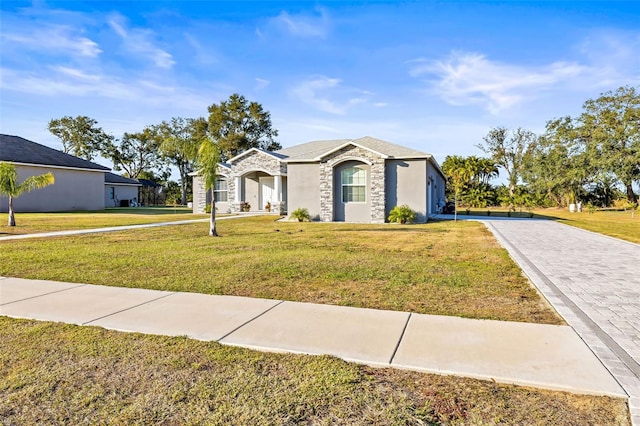 ranch-style house with a front yard