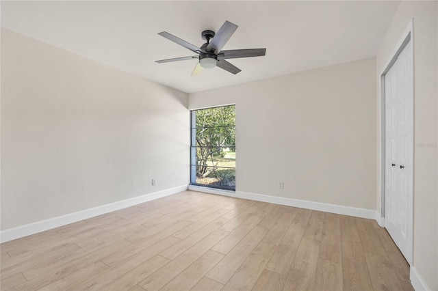 unfurnished room featuring ceiling fan and light hardwood / wood-style flooring