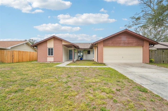 single story home with a front yard and a garage