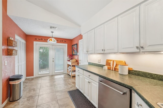 kitchen featuring vaulted ceiling, white cabinetry, dishwasher, and hanging light fixtures