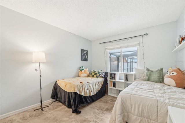 bedroom featuring a textured ceiling