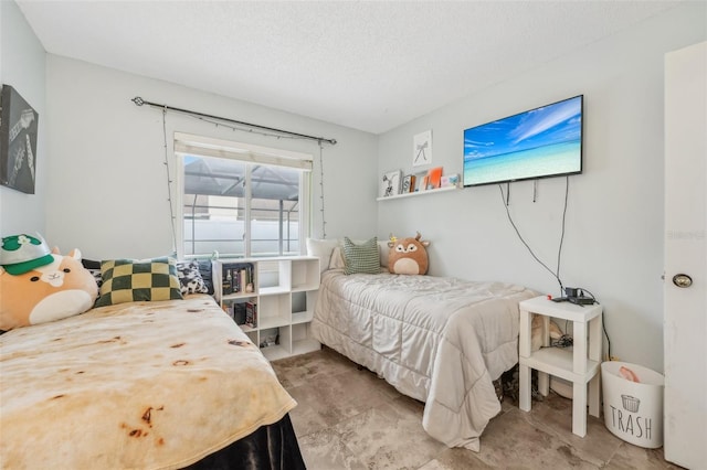 bedroom featuring a textured ceiling