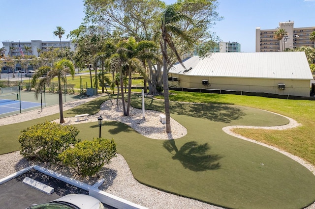19451 Gulf Blvd Unit 204, Indian Shores, FL 33785 - surrounding community with a yard, a tennis court, and fence