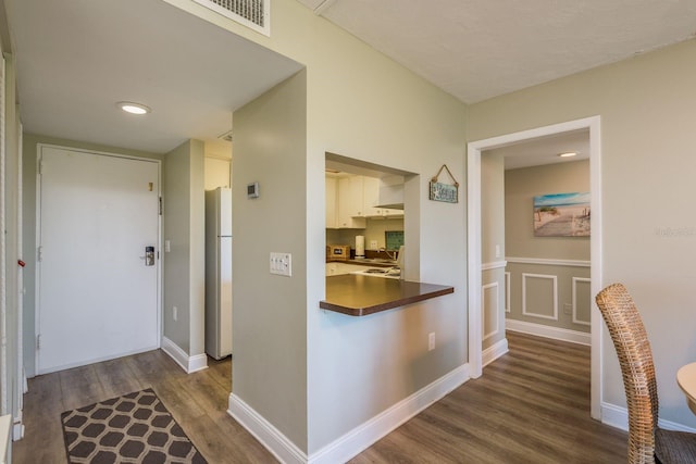 19451 Gulf Blvd Unit 204, Indian Shores, FL 33785 - hall featuring recessed lighting, visible vents, baseboards, and dark wood-style flooring