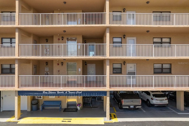 19451 Gulf Blvd Unit 204, Indian Shores, FL 33785 - view of property with covered parking