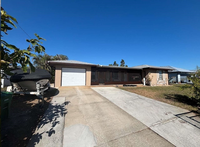 view of front of home featuring a garage