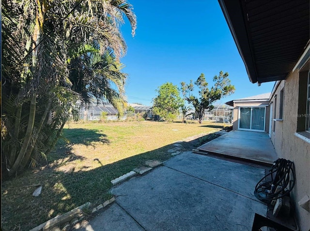 view of yard with a patio area