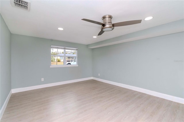 unfurnished room with light hardwood / wood-style floors and ceiling fan